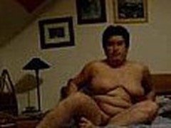 Well here's one more chubby aged mom taping herself during a masturbation session in this episode clip. She fingers her bawdy cleft with as many fingers as she needs while showing off her heavy saggy mounds