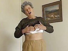 Sexy granny Rosa takes her raiment off and discloses that saggy tits of hers. That babe squeezes them for greater amount enjoyment and lays down on the bed. The horny old lady spreads her legs and fingers her cunt a little. That babe has a dildo and is ready to play with it. Want to watch her sucking and sticking it in her pussy?